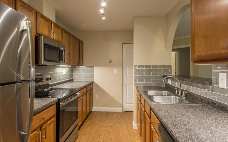 a kitchen with stainless steel appliances